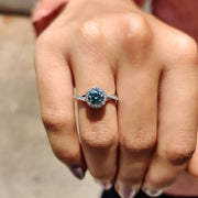 Cyan Blue Round Cut Engagement Ring With Twisted Pave