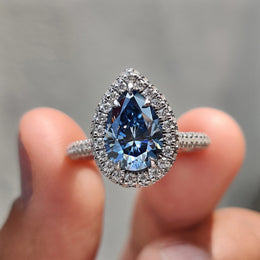 Pear Cut Engagement Ring With Halo Setting