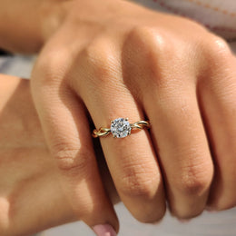 Round Moissanite Twisted Shank Engagement Ring