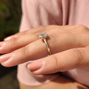 Emerald Cut Solitaire Ring In Yellow Gold With Basket Design