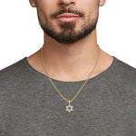 Pave-Set Lab-Grown Diamond Men's Star of David Pendant worn by a man with a beard on a gray shirt.