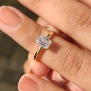 Emerald Cut Solitaire Ring In Yellow Gold With Basket Design
