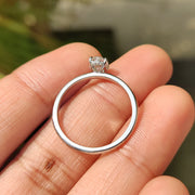 Oval Solitaire Engagement Ring With Hidden Halo