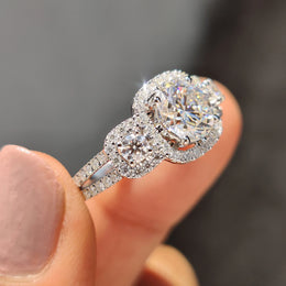 Round Cut Moissanite Engagement Ring In White Gold